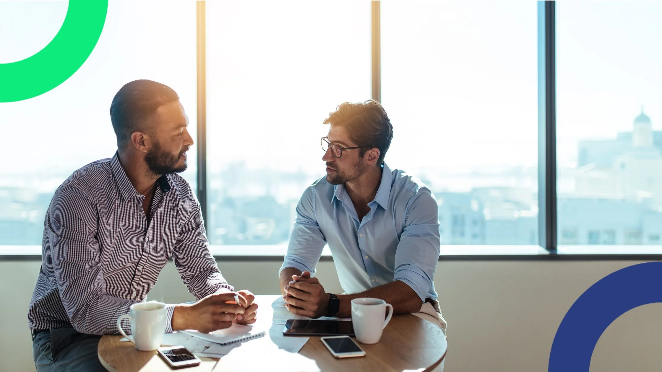 Two employees discussing when to write a whitepaper