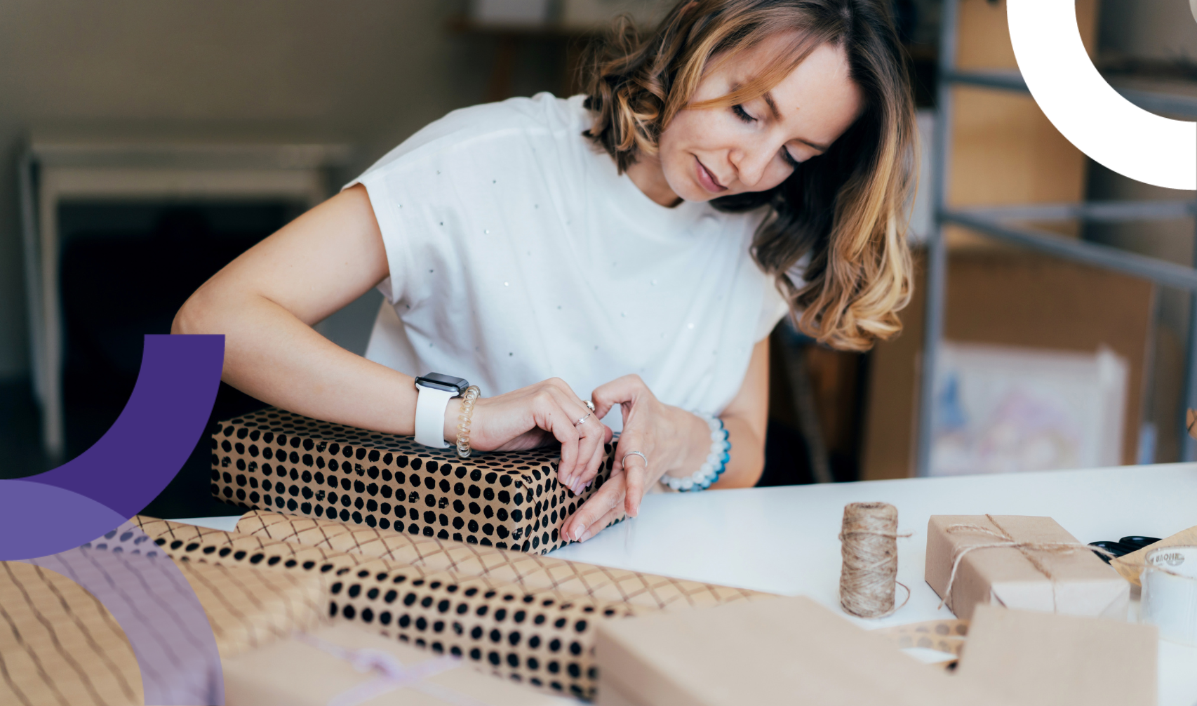 woman wrapping a gift